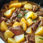 Slow Cooker Steak and Cheddar Potato Casserole
